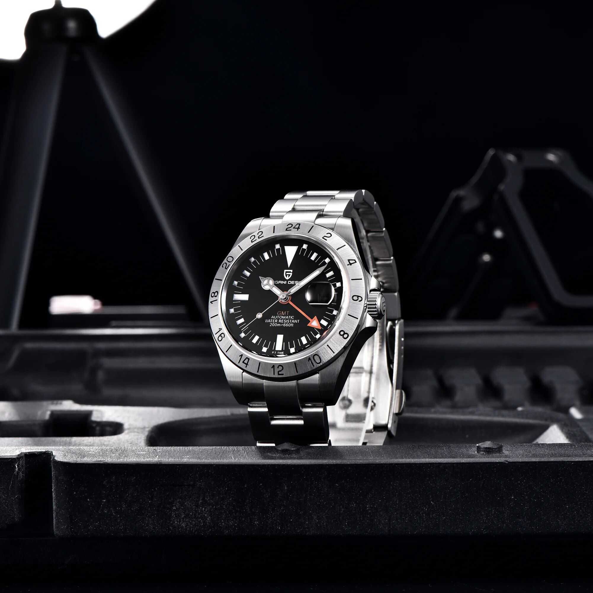 Elegant stainless steel men's watch showcasing GMT and automatic features, water-resistant up to 200m, ideal for sports and fashion enthusiasts.