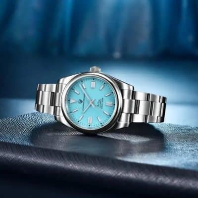 Stylish silver watch featuring a blue dial, perfect for men and women, high-quality design for luxury and precision. Ideal for accessorizing professional and casual outfits.