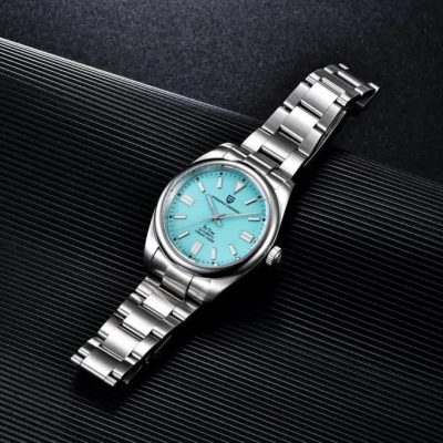 Luxurious stainless steel wristwatch with a vibrant blue dial, precise quartz movement, and durable design, perfect for stylish men and women.