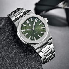 A modern stainless steel automatic watch with a green textured dial and bold hour markers, perfect for luxury accessory and timekeeping needs.