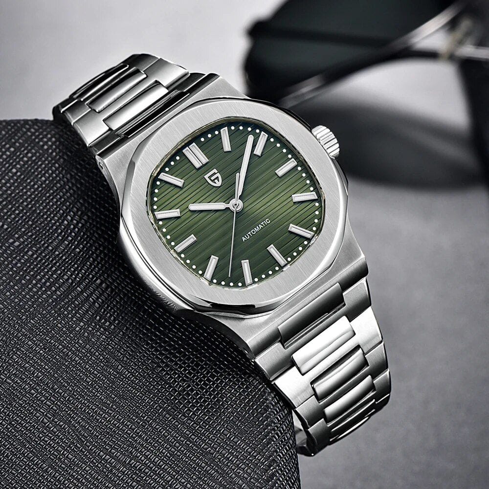 A modern stainless steel automatic watch with a green textured dial and bold hour markers, perfect for luxury accessory and timekeeping needs.