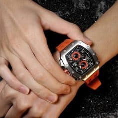High-end men's wristwatch with orange rubber strap, chronograph functions, and stylish modern design for luxury eyewear and accessory collection.