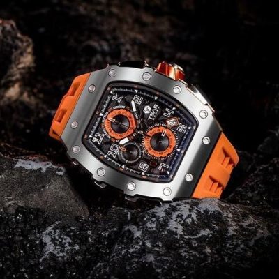 A stylish luxury watch featuring a bold orange strap and intricate chronograph dials, ideal for those seeking fashionable accessories. Shop now at Monalisa Store for unique eyewear, watches, and premium accessories.