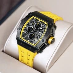 High-end luxury watch featuring a bold yellow strap, intricate dial design, and durable black case, perfect for stylish accessorizations and timekeeping.