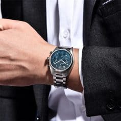 A sophisticated men's wristwatch showcasing a stainless steel band and blue dial, ideal for luxury watch collectors and fashion-conscious individuals seeking high-end accessories.