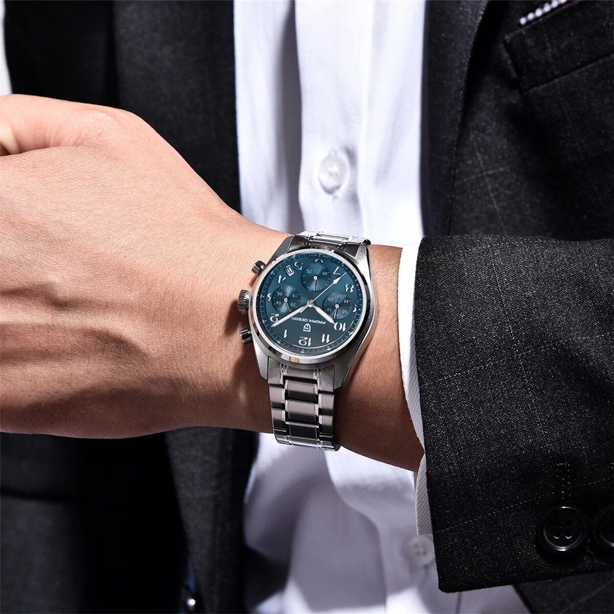 A sophisticated men's wristwatch showcasing a stainless steel band and blue dial, ideal for luxury watch collectors and fashion-conscious individuals seeking high-end accessories.