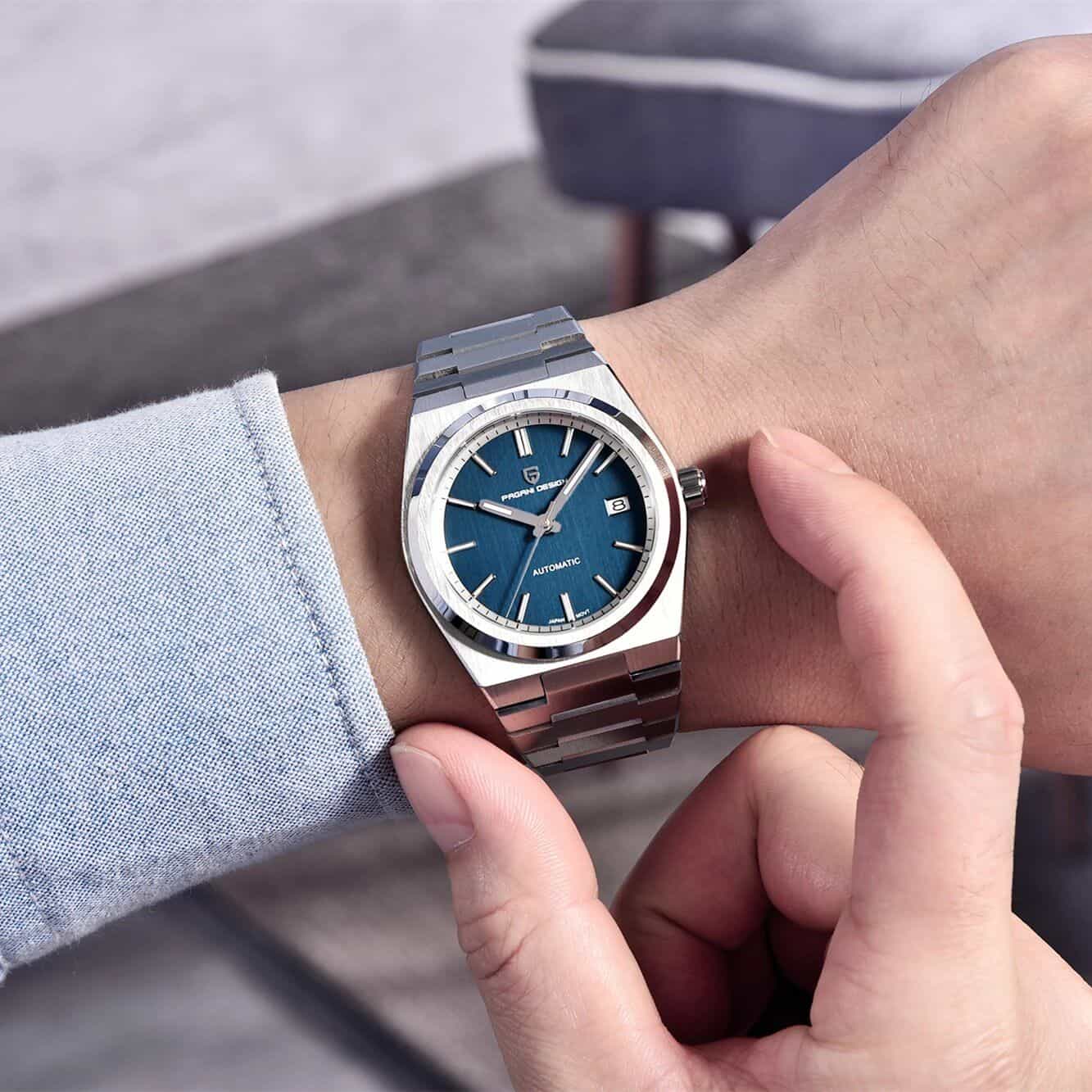 Elegant men's wristwatch showcasing automatic movement, a blue dial, and date display, ideal for fashion-conscious individuals and watch collectors.