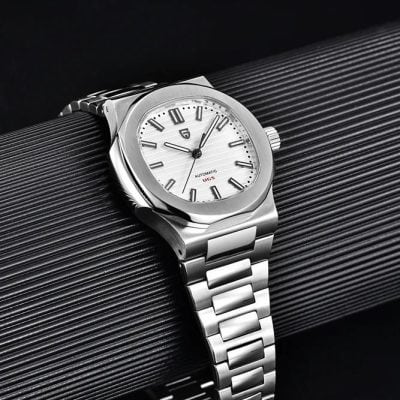 Elegant stainless steel automatic wristwatch with white dial and modern design.