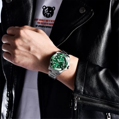 High-end men's sports watch with green face, rotating bezel, and date window, perfect for active lifestyles.