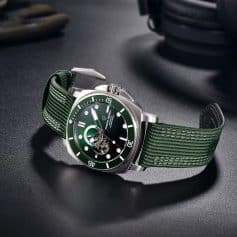 A stylish men's green dive watch with a stainless steel case and a durable green strap, featuring a skeleton dial and high water resistance, perfect for collectors and enthusiasts.