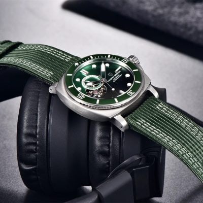 High-quality green dial wristwatch with sporty design, automatic movement, and durable strap, perfect for watch enthusiasts and collectors.