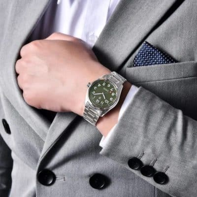 Elegant men's stainless steel wristwatch with black dial, suitable for formal occasions and luxury fashion.