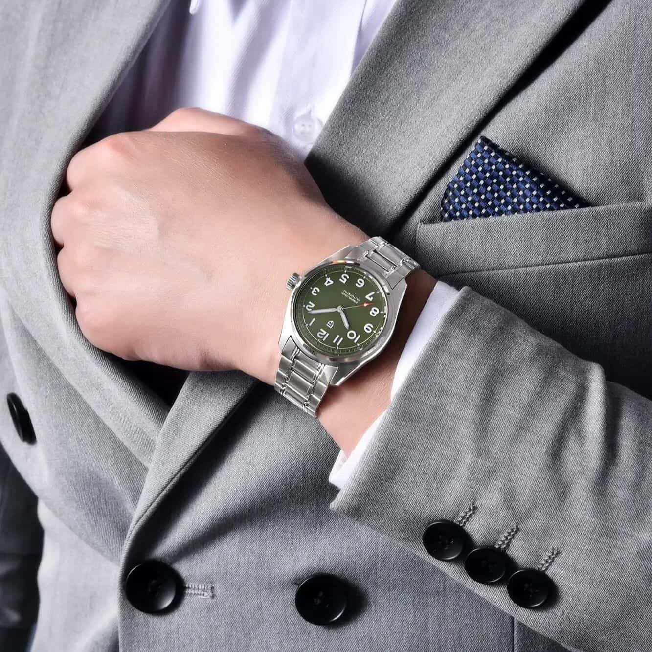 Elegant men's stainless steel wristwatch with black dial, suitable for formal occasions and luxury fashion.