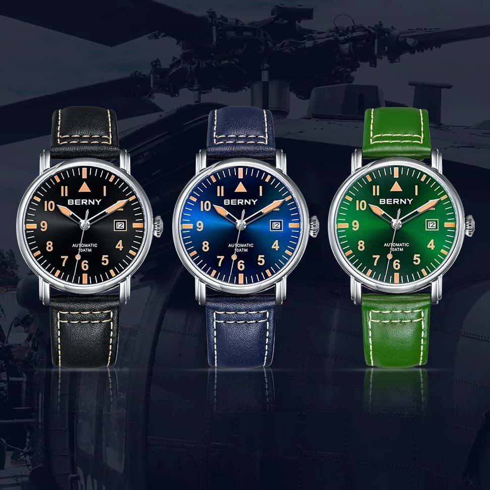 High-quality men's wristwatches in black, blue, and green with leather straps, Swiss automatic movement, and date display for luxury and style.