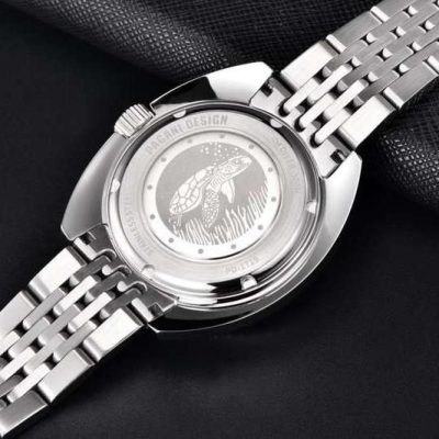 High-quality silver wristwatch featuring a detailed fish engraving on the back, perfect for watch enthusiasts and collectors. Explore luxury and stylish timepieces at Monalisa Store.