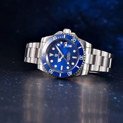 High-quality stainless steel watch with blue bezel and dial, features date magnifier, water-resistant, ideal for diving and everyday wear.