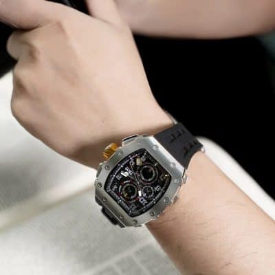 High-end men's chronograph watch with durable black silicone strap, stainless steel case, and detailed dial, perfect for luxury wristwear collection.