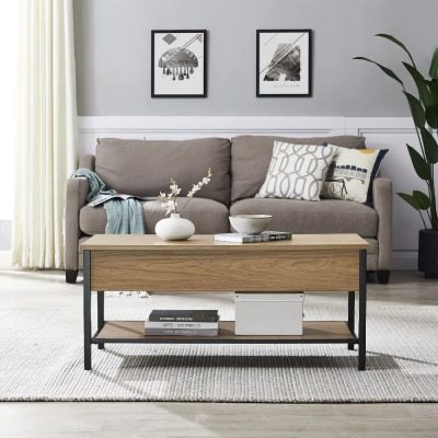 Elegant living room featuring a neutral-toned sofa, decorative cushions, contemporary art, and a cozy coffee table, ideal for modern home interiors and comfort.