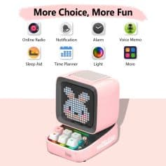 A pink pixel art toy featuring a digital display, colorful buttons, and animated graphics, ideal for creative play and decor, perfect for children and digital art enthusiasts.