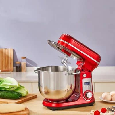 High-quality red kitchen stand mixer with stainless steel mixing bowl, perfect for baking, cooking, and food preparation. Features adjustable speed control and modern design for home chefs.