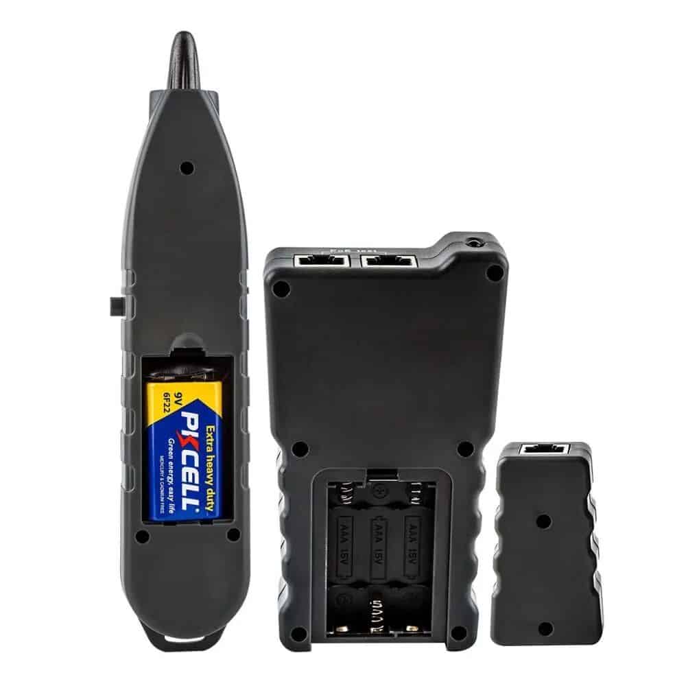 Compact handheld LED tester for optometry and vision care instruments, featuring battery compartment access and multiple ports for precise testing and maintenance.