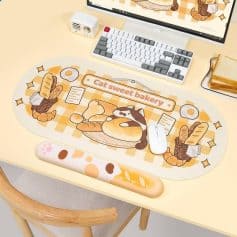 Cute cat bakery-themed desk mat with bread and pastry illustrations, perfect for adding charm and comfort to your workspace with this adorable design.