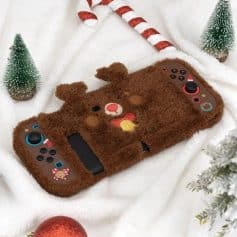 Adorable reindeer-themed fuzzy phone case featuring festive holiday decorations, ideal for Christmas accessories and gift ideas.
