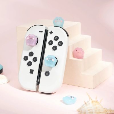 Adorable Nintendo Switch-style gaming controller with pastel squishy star grips, perfect for gaming fun and stress relief, displayed in a cheerful, colorful setting.