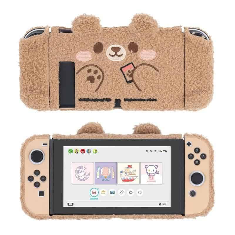 Adorable teddy bear-themed Nintendo Switch cover with plush texture and friendly face design, perfect for protecting your gaming console in style and adding a fun, cute touch to your gaming setup.