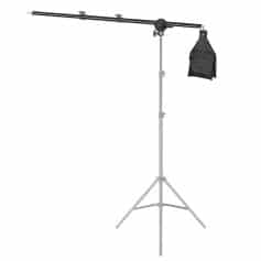 Adjustable photography lighting stand with boom arm, supporting professional lighting setups, studio lamps, and accessories for optimal photo and video production.