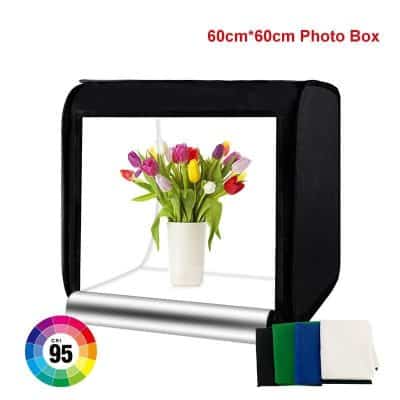 Photo studio light box for professional floral photography and product display. Compact 60x60cm size with high color rendering index CRI 95, perfect for vibrant flower images. Includes backdrop sheets for clean backgrounds.