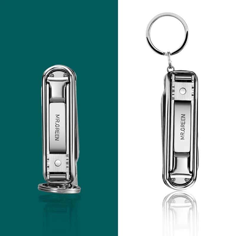 Stylish metal nail clipper keychain with engraved "MR.GREEN" for convenience and style. A perfect accessory for personal use or as a gift, combining functionality with sleek design.