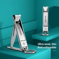 Ultra small, portable, collapsible pocket razor with keyring for travel and personal grooming needs.
