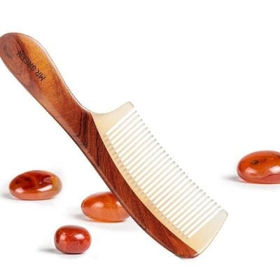 Ultra-soft wooden hairbrush with boar bristles for gentle scalp massage and detangling. Perfect for salon and personal use, promotes healthy hair growth, suitable for all hair types.