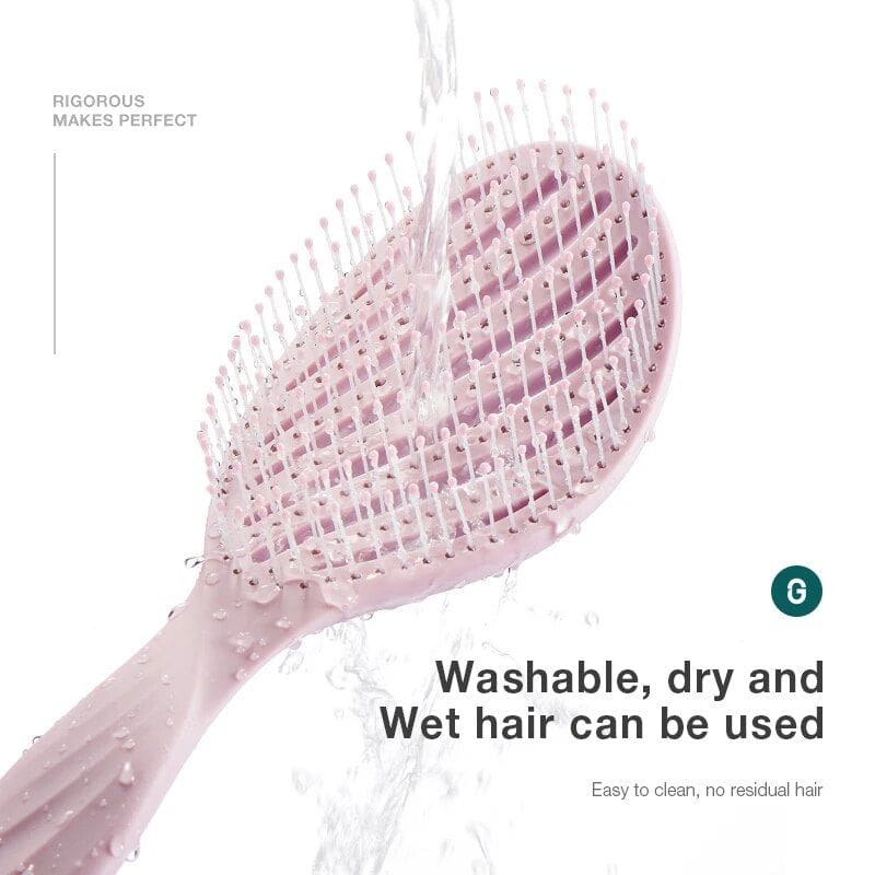 Pink washable, dry, and wet hairbrush for effective hair detangling and styling, easy to clean, reusable, and gentle on scalp for all hair types.