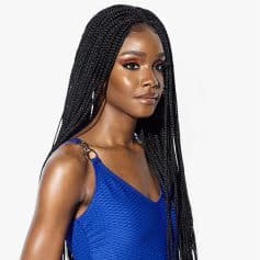 Close-up of a woman with sleek braided hair and sophisticated blue dress, showcasing stylish eyewear options available at Monalisa Medical Store for fashionable and eye health needs.