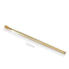 A close-up of a gold eyelash brush pen for detailed and accurate eyelash extension application.