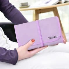 Portable eye care accessory holder featuring Yuwaku branding for convenient vision health management.