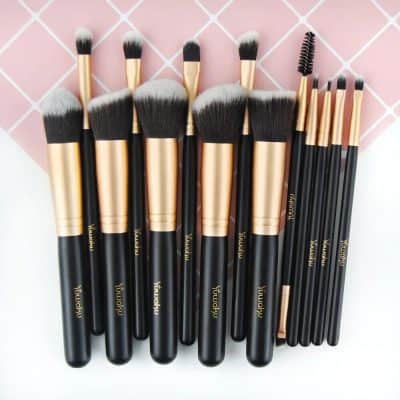 High-quality makeup brushes for beauty professionals and enthusiasts, ideal for precise application of foundation, eyeshadow, and blush. Durable, soft bristles with elegant black and gold handles.