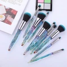 High-quality makeup brushes with colorful, iridescent handles and soft bristles, perfect for professional and personal cosmetic use. Stylish tools available at Monalisa Store.