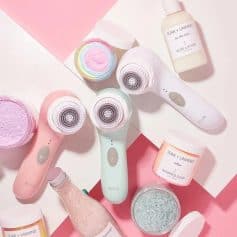 High-quality skincare tools and products displayed, including facial cleansing brushes, aloe lotion, whipped soap, and exfoliating salts, perfect for skincare routines and beauty treatments.