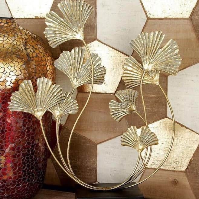 Stylish gold-colored ginkgo leaf sculpture for home or restaurant decor, ideal for adding a modern, sophisticated touch to your interior design. Perfect for enhancing aesthetic appeal with luxury accents.