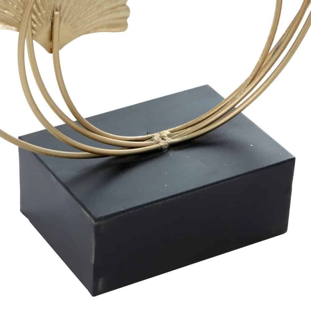 Optical stand for displays with a sleek black base and intricate rattan design, ideal for showcasing various products in retail or gallery settings.