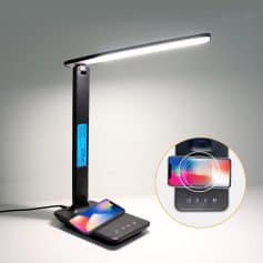 LED desk lamp with digital clock, wireless charging pad, and versatile adjustable light for optimal workspace illumination and convenience.