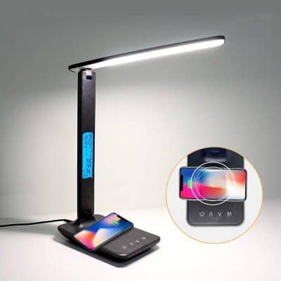 LED desk lamp with digital clock, wireless charging pad, and versatile adjustable light for optimal workspace illumination and convenience.