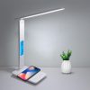 LED desk lamp with adjustable arm, built-in wireless phone charger, digital clock, and temperature display, perfect for modern office and study spaces.