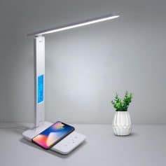 LED desk lamp with adjustable arm, built-in wireless phone charger, digital clock, and temperature display, perfect for modern office and study spaces.