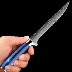 High-quality Damascus steel chef knife with a stylish blue handle, perfect for professional chefs and home cooking enthusiasts.