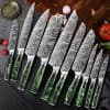 High-quality Damascus steel knives with elegant swirling patterns, perfect for professional chefs and home cooking. Ergonomic green resin handles enhance grip and style.