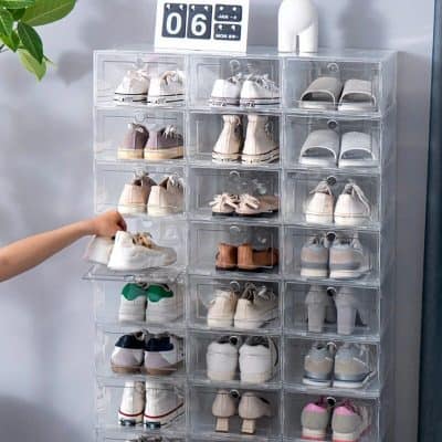 An organized clear shoe storage cabinet for sneakers, perfect for shoe lovers and collectors. Compact design with multiple compartments to keep sneakers neat and accessible.